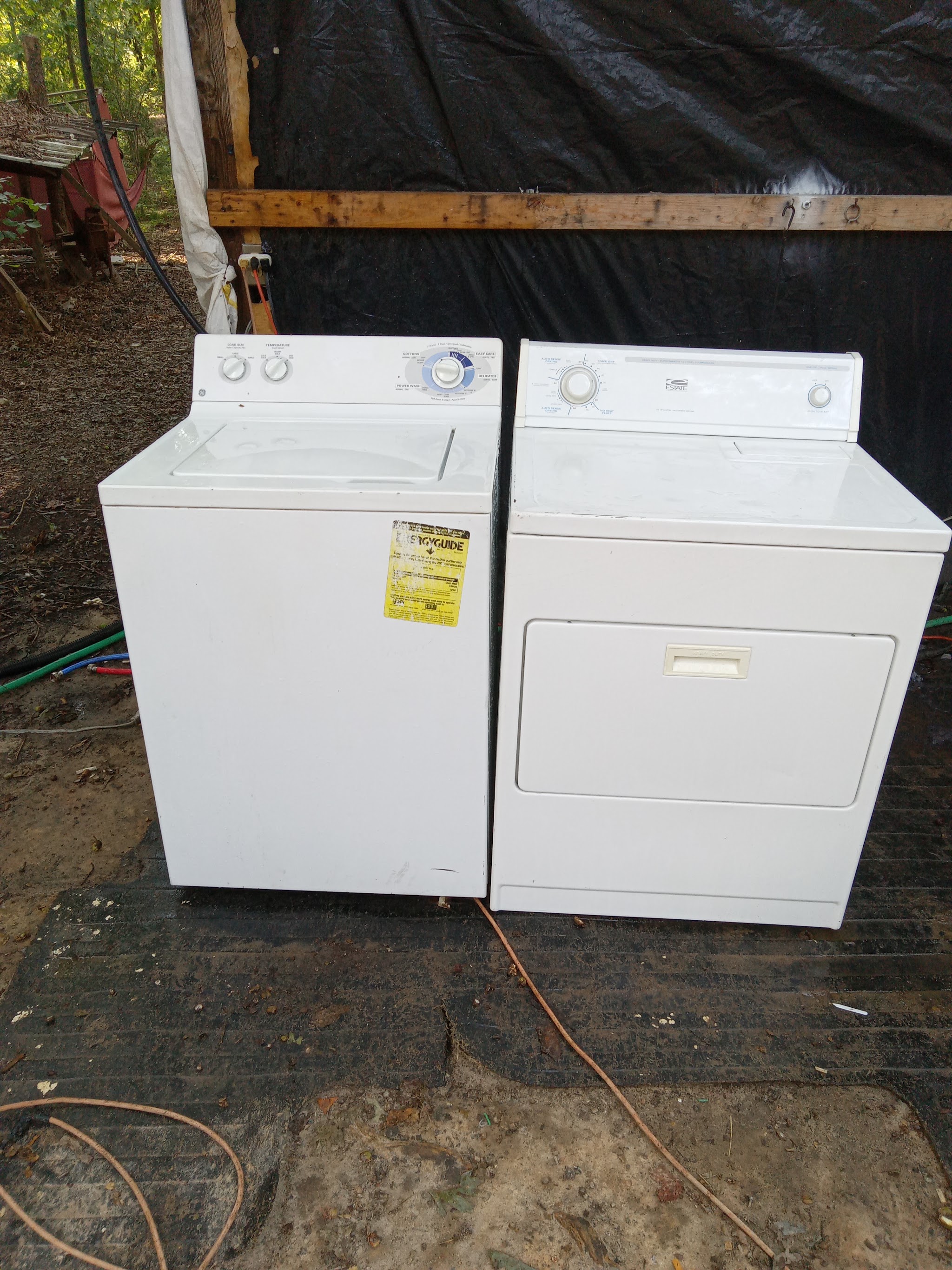 A washer and dryer pair ready for repair